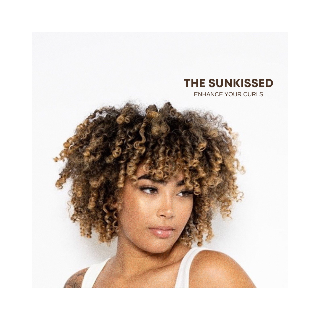 Second transformation after: defined curls with golden highlights, in Bee’s Sun-Kissed campaign artwork