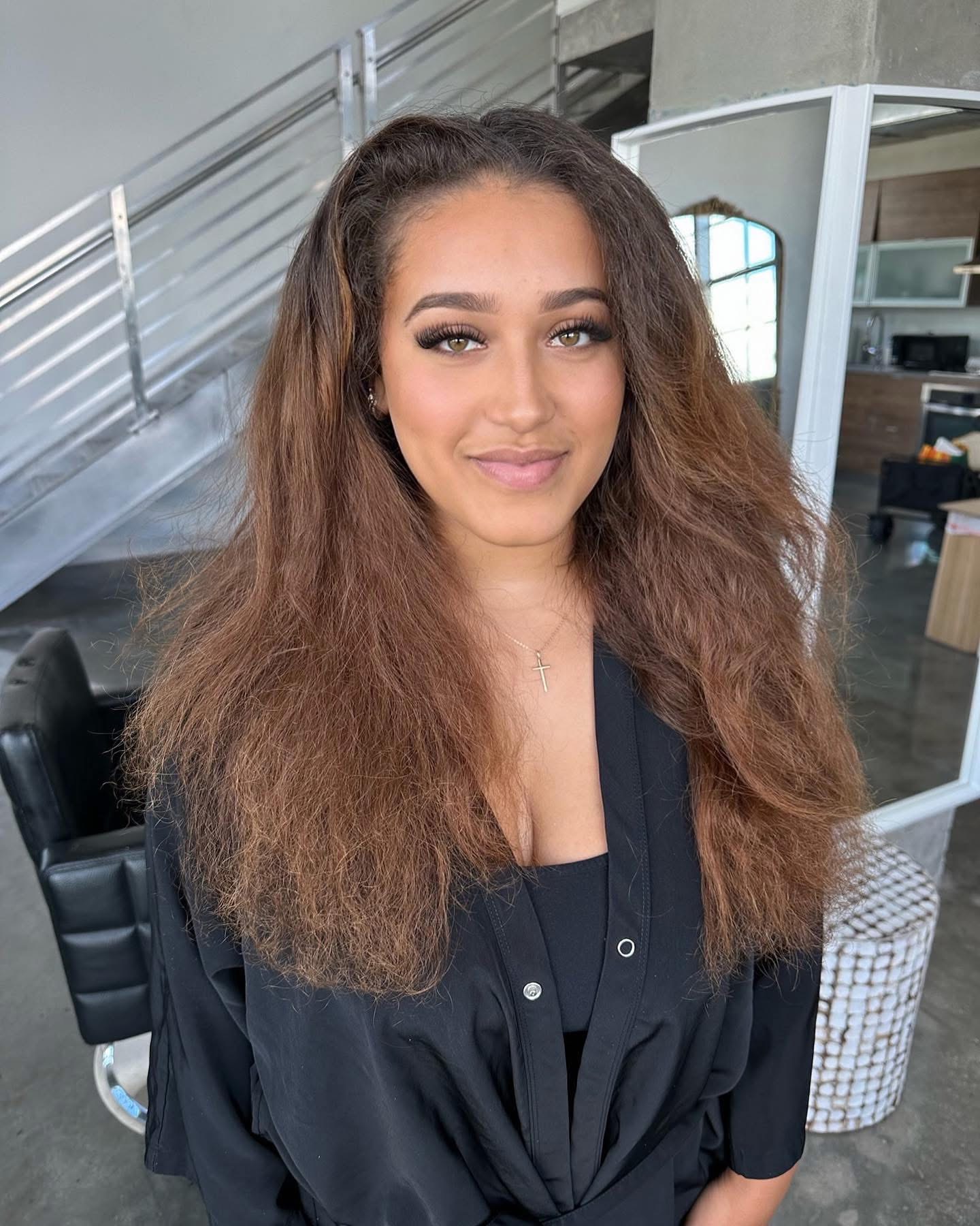 Client transformation before: the client’s hair before color and curl styling
